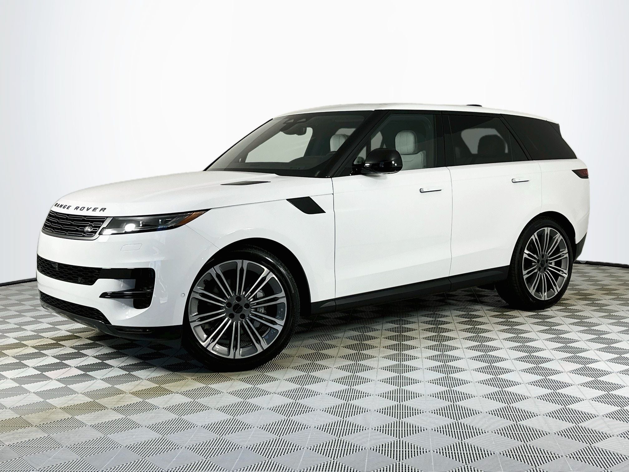 2026 Land Rover Range Rover Sport SE in Fuji White — front three-quarter view