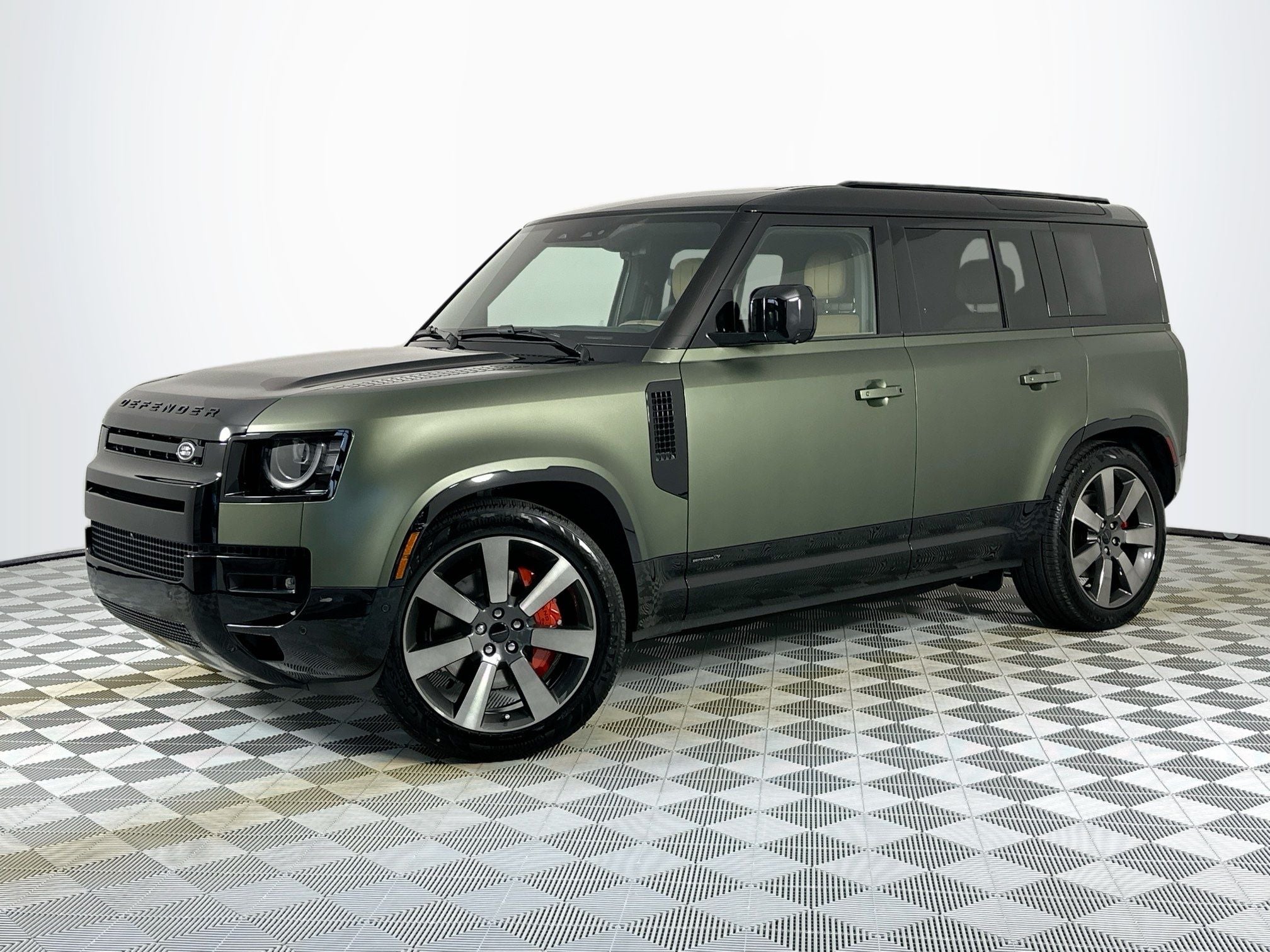 2026 Land Rover Defender 110 Base in Green — front three-quarter view