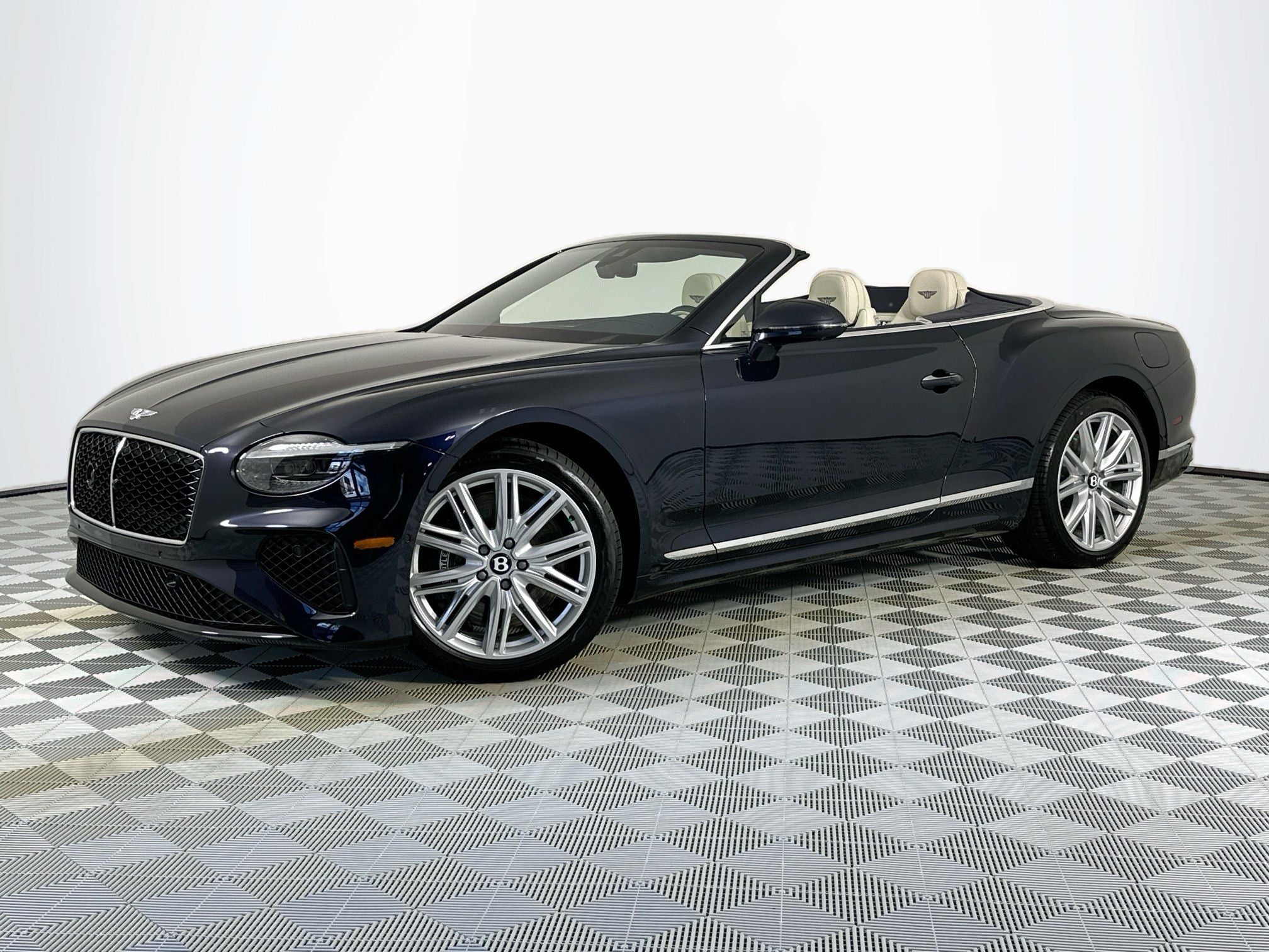 2026 Bentley Continental GTC Base in Dark Sapphire — front three-quarter view