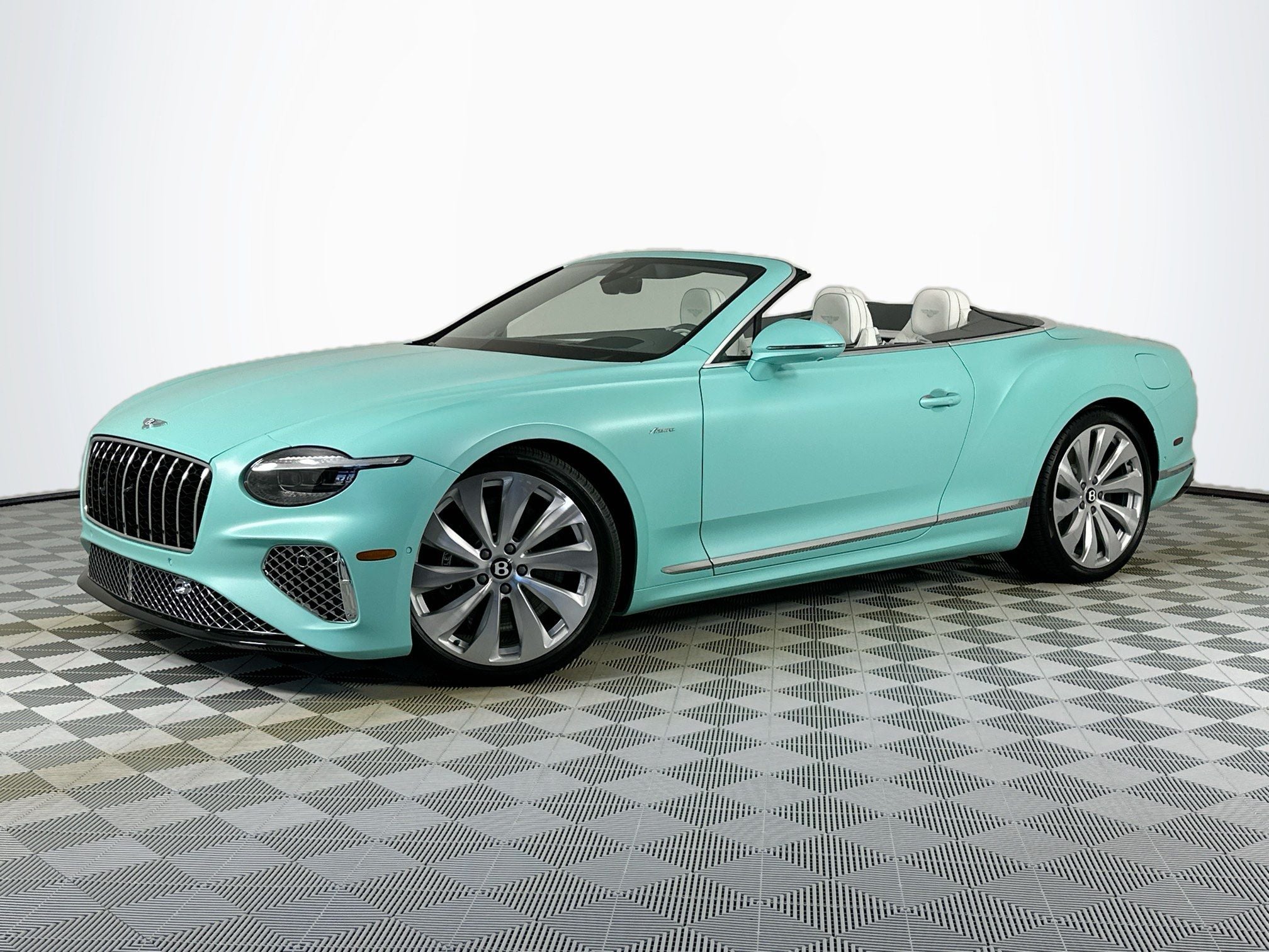 2026 Bentley Continental GTC Azure in Satin Celeste Pearlescent — front three-quarter view