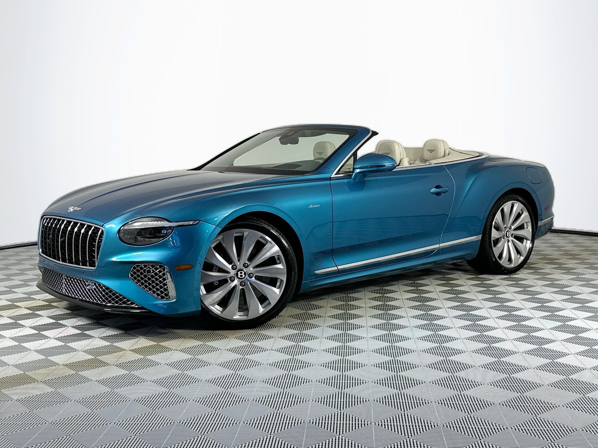 2026 Bentley Continental GTC Azure in Topaz Blue — front three-quarter view