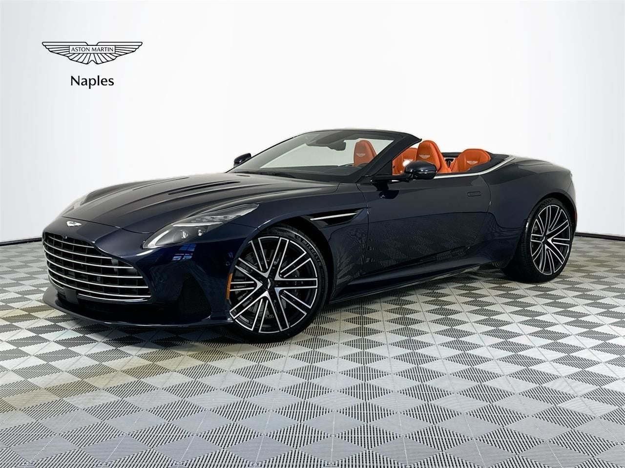 2026 Aston Martin DB12 Volante in Midnight Blue — front three-quarter view